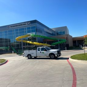 One of the Tioga Plumbing & Drain service trucks at The Bedford Center YMCA in Bedford Texas.