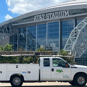 The Tioga Plumbing & Electric parked outside the AT&T Stadium in Arlington Texas.