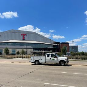 A Tioga Plumbing & Electric truck at The Texas Rangers Stadium in Arlington Texas.