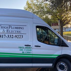 A Tioga Plumbing & Electric service van at the Hulen Park in Cleburne Texas.