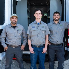 Some of the amazing Plumbing Service and Electrical Services team from Tioga Contractors with the utility van in the Hurst, TX area.