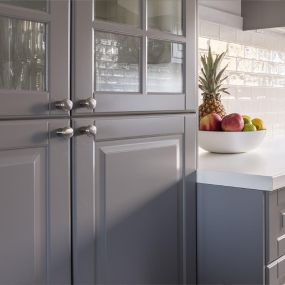 kitchen cupboards cabinets and drawers spray painted grey giving the appearance of a brand new kitchen