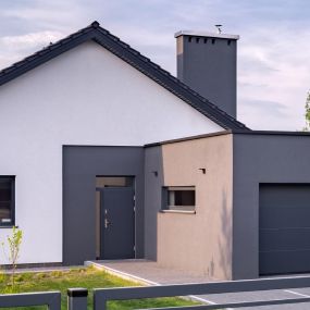 full property transformation with the exterior walls, windows, doors and garage doors spray painted in anthracite grey and white by UPVC Spray Painters