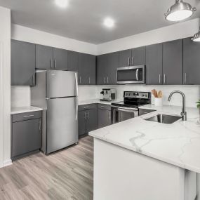 Kitchen quartz countertops and stainless steel appliances