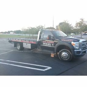 Offers Low-Cost Tow Truck Service!