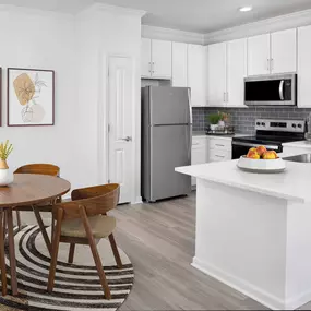 Kitchen and dining room at Camden Montague apartments in Tampa, FL