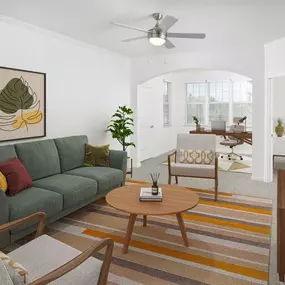 Living room and flex space at Camden Montague apartments in Tampa, FL