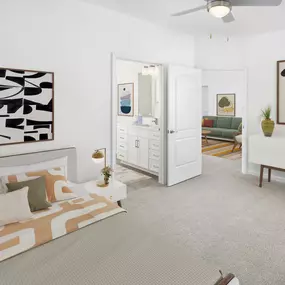 Bedroom with ensuite bath at Camden Montague apartments in Tampa, FL