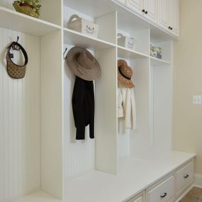 Having a place at the entryway is great for storing items like shoes, jackets, hats, umbrellas, and other outdoor items. It also helps to keep the entryway organized and free of clutter. Many entryways have built-in storage solutions, such as shelves or hooks, while others have furniture, such as a