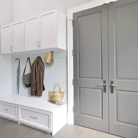 Keep all your outdoor gear tucked behind closed doors with this Entryway Storage Solution. The bench seat provides seating for putting on and taking off shoes, encouraging your guests to get comfortable, and protecting your house from dirt.