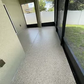 Indoor-outdoor spaces need tough flooring! That’s why we recommended an Epoxy Patio Floor for these Riverview homeowners. It was a great choice for this sunroom—and you’ll love it, too!