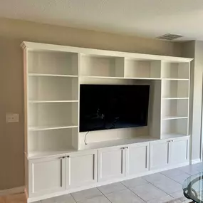 Tampa residents! Get ready to take your home entertainment to the next level with our bespoke, hand-built Entertainment Center. Crafted with precision and tailored to your unique style and dimensions of your home, it's the ultimate centerpiece! Binge-watch in style and turn movie nights into unforgettable experiences.