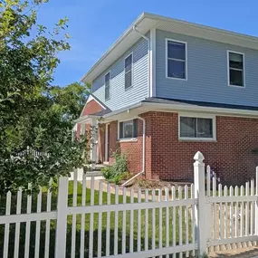 Curb appeal for days on this beautiful home addition by Balbes Custom Builders. Idyllic charm and custom details, surrounded by greenery, it's a place to love coming home to.