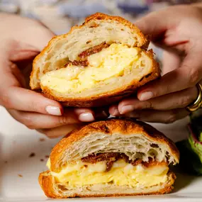 Parisian Stuffed Croissant: Scrambled eggs, applewood smoked bacon, gruyere