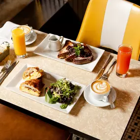table filled with brunch food and drinks