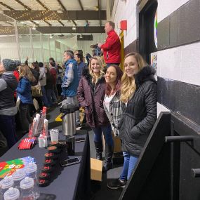 Engaging with the community during a local hockey game