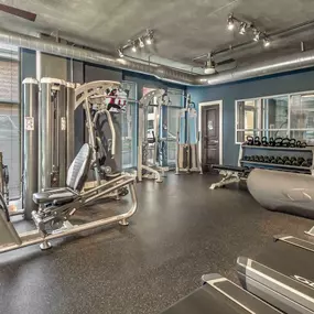 24 hour fitness center with cardio and strength training equipment