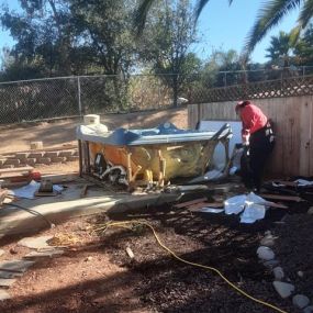 Junk King hard at work on a hot tub removal.