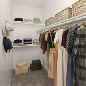 Walk-in closet with built-in shelves at Camden Valley Park