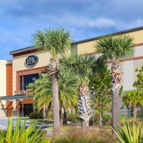Neighborhood shopping plaza featuring EPIC movie theater near Camden Lee Vista apartments in Orlando, Florida.