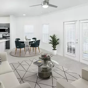 Open-concept living room and kitchen at Camden Lee Vista apartments in Orlando, FL