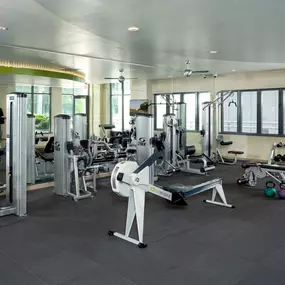 24-Hour Fitness Center with Free Weights and Row Machine