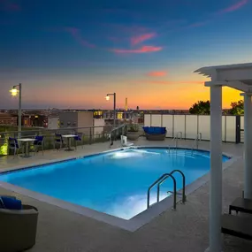 Camden NoMa apartments in Washington D.C. rooftop pool at sunset.