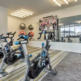 Two 24 hour fitness centers yoga and cycling studio