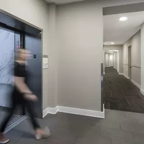 Community elevator in interior hallway at Camden Victory Park apartments in Dallas, TX