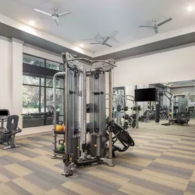 24-hour fitness center with a motion cage functional training machine at Camden Victory Park