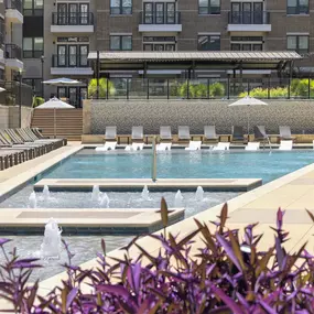 Resort-style pool with fountains at Camden Victory Park apartments in Dallas, TX