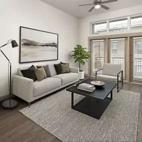 Open-concept living room with private balcony and high ceilings at Camden Victory Park apartments in Dallas, TX