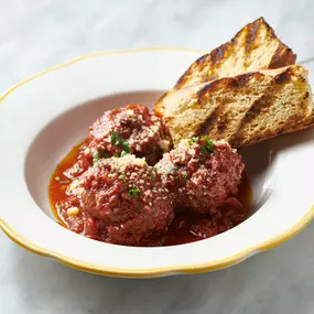 NONNA'S MEATBALLS - creamy polenta, tomato sauce, roasted long hot pepper