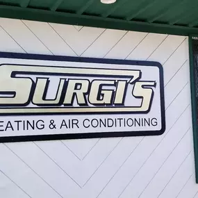 Surgi's Heating, Cooling & Plumbing work sign