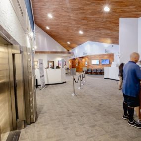 Interior lobby of federal credit union with finance professionals