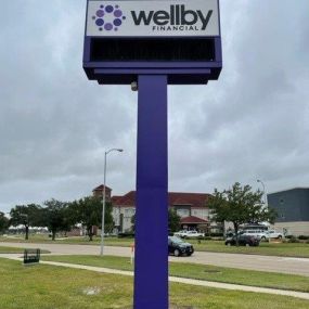 Exterior signage of Wellby Financial in Deer Park
