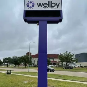 Exterior signage of Wellby Financial in Deer Park