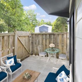 Classic style fenced outdoor patio
