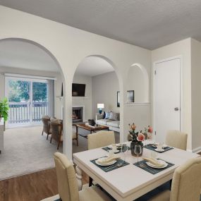 Classic style dining room with arched entry to living room