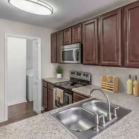 Traditional style kitchen with stainless steel appliances