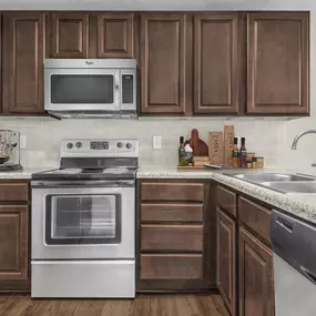 Traditional style kitchen with stainless steel appliances