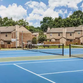 Fenced tennis courts