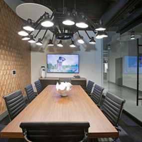 Private conference room with tv in the hub community workspace