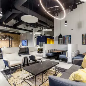 Resident lounge and banquette seating area near private conference room