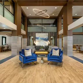 Resident lobby lounge entrance with double height ceiling