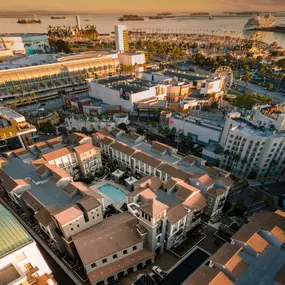 Aerial view of Camden Harbor View Apartments near ocean and the Queen Mary