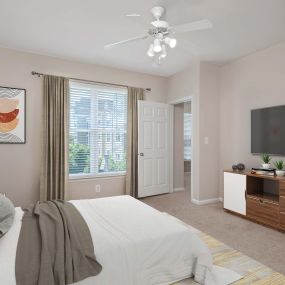 Bedroom with ceiling fan at Camden Fallsgrove