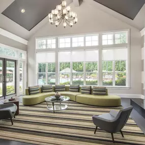 Resident lounge with electric fireplace at Camden Fallsgrove in Rockville, MD