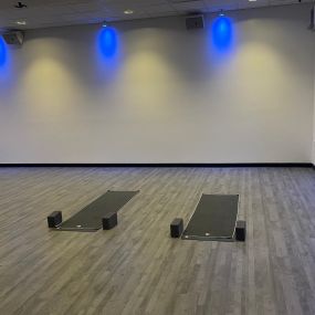 Yoga studio with blue lights