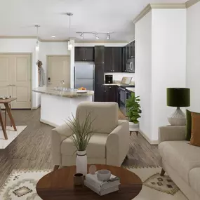 Open-concept kitchen and dining in apartment home at Camden Town Square in Kissimmee Florida